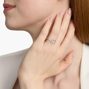 Delicate Hidden Halo Solitaire with Diamond Accent Engagement Ring in Platinum